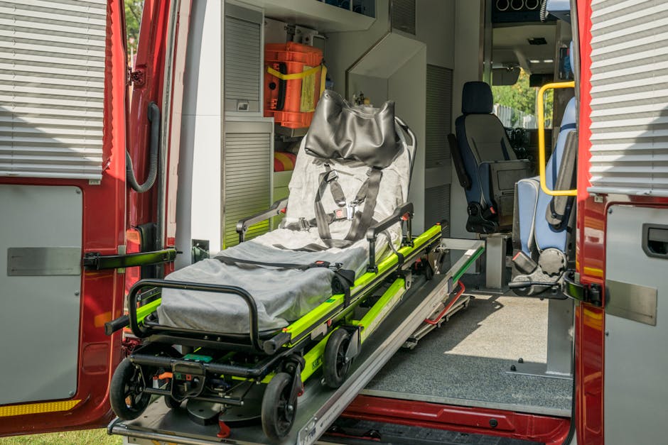 Inside view of a modern emergency ambulance showing a stretcher for patient transport.