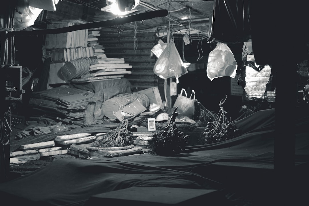 A black and white photo of a room filled with items