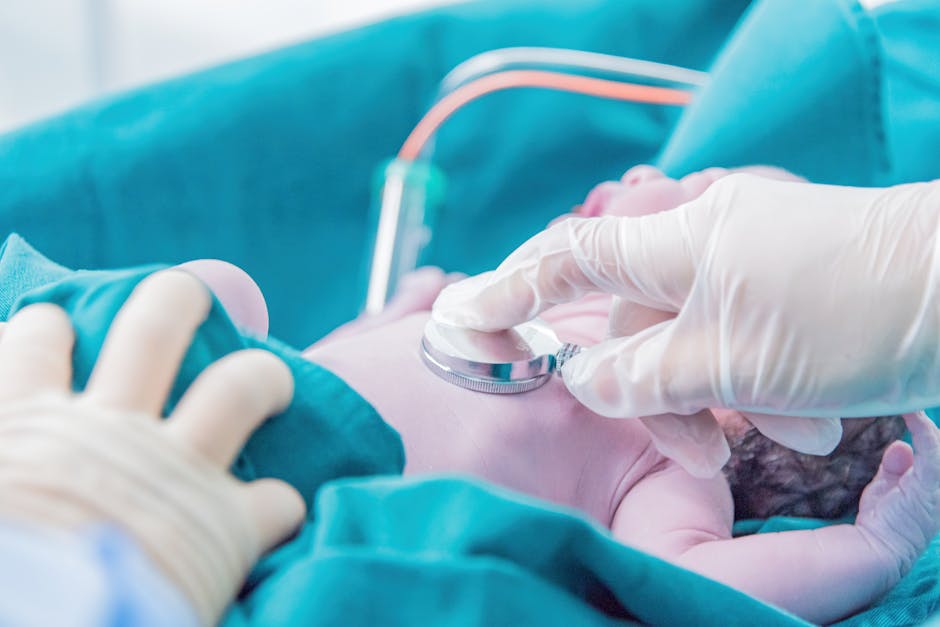Medical professional examining a newborn baby with a stethoscope in a hospital setting. (Photo: Lemniscate L) Medical professional examining a newborn baby with a stethoscope in a hospital setting.