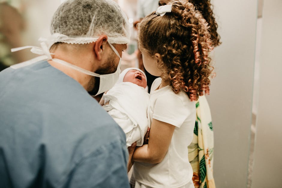 A happy family moment as a young girl meets her newborn sibling in the hospital. (Photo: Jonathan Borba) A happy family moment as a young girl meets her newborn sibling in the hospital.