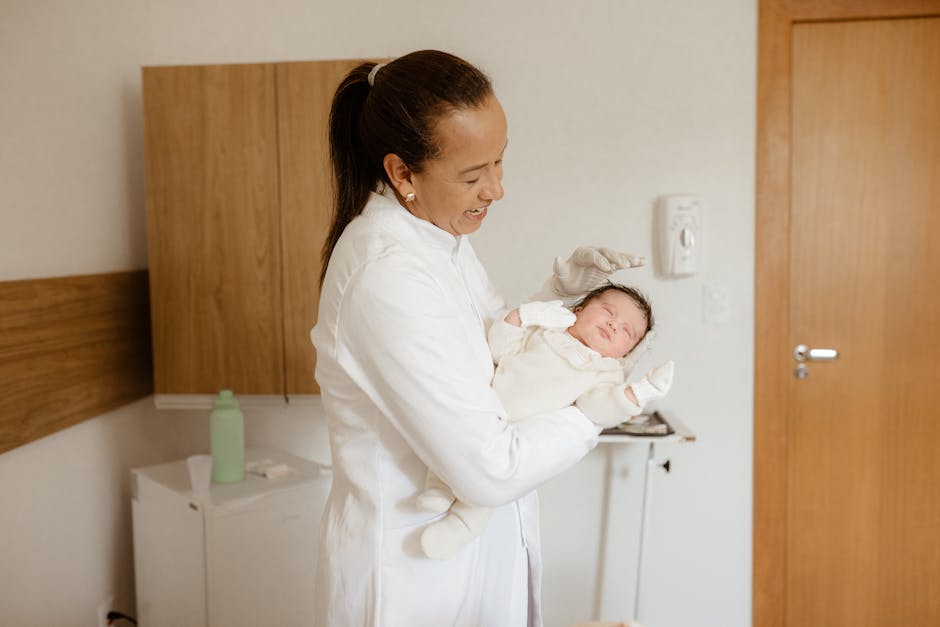 A medical practitioner gently holding a newborn baby in a hospital room, symbolizing care and health.
